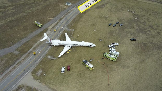 The day after the accident, the NTSB asked the Michigan State Police to take drone photos of the Ameristar Air Cargo MD-83 where it came to a stop after rolling 1,000 feet beyond the runway.