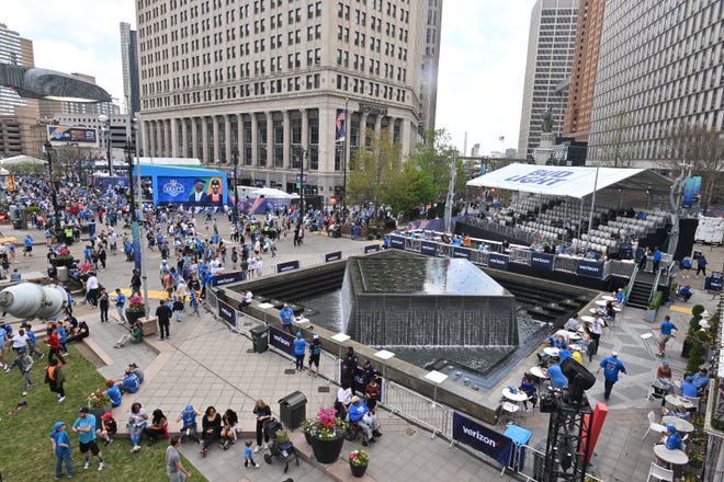 Crowds around the fountain in Campus Martius on Day 3 of the 2024 NFL Draft in Detroit.