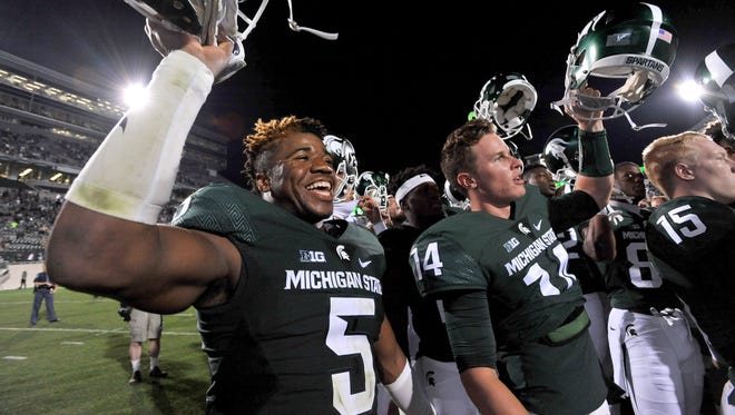 Michigan State's Andrew Dowell (5) and Brian Lewerke (14) are looking to help the Spartans beat Notre Dame on Saturday to improve to 3-0.