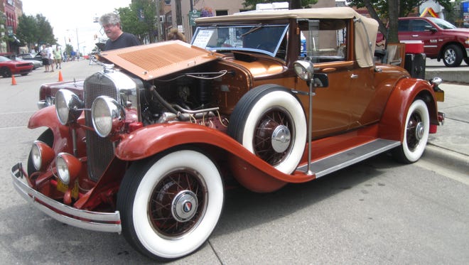 A two-tone 1930 LaSalle rumble-seat convertible coupe with updated interior and top was shown by Bob Dowell of Chesterfield Township. Powell owns three LaSalles.