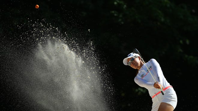 Chella Choi of South Korea hits from a bunker to the sixth green during the first round of the LPGA Volvik Championship on May 24, 2018 at Travis Pointe Country Club Ann Arbor, Michigan.