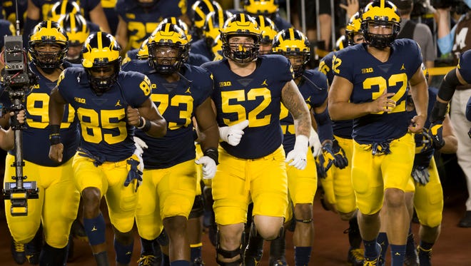 Go through the gallery to view the Michigan football program's 2019 commitments (star ratings according to the 247Sports Composite), with analysis from Angelique S. Chengelis of The Detroit News.