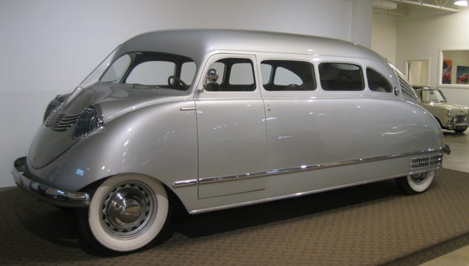 One of a handful of Stout Scarabs built in the mid-1930s in Dearborn, this 1936 model has two loose seats for passengers and room for a table in its capacious interior. The driver's seat and rear seat are bolted in place.