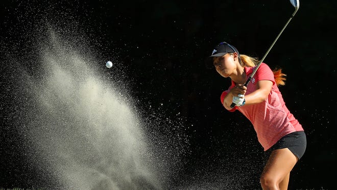 Danielle Kang hits from bunker to the sixth green during the first round of the LPGA Volvik Championship on May 24, 2018 at Travis Pointe Country Club Ann Arbor, Michigan.