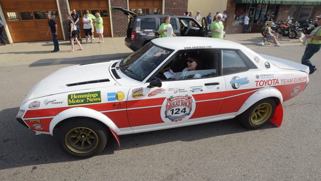 Team Nippon 2 with driver Takuya And and navigator Chie Ando in their 1972 Toyota Celica GTV.