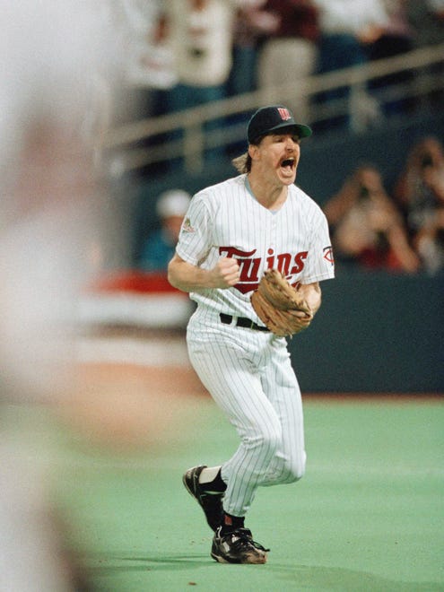 The Minnesota Twins Jack Morris lets out a yell as he heads to the dugout after his teammates turned a double play on the Atlanta Braves to get him out of the eighth inning of Game 7 of the World Series, Sunday, Oct. 27, 1991, Minneapolis, Minn.