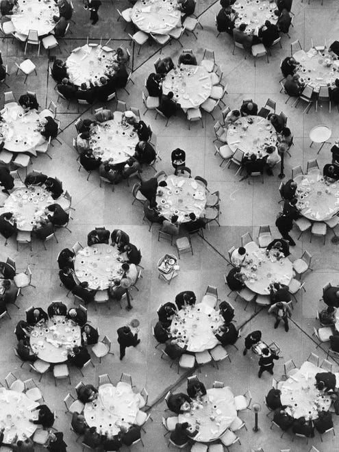 The terrace restaurant at the Hotel Pontchartrain hosts a lunchtime crowd in 1968.