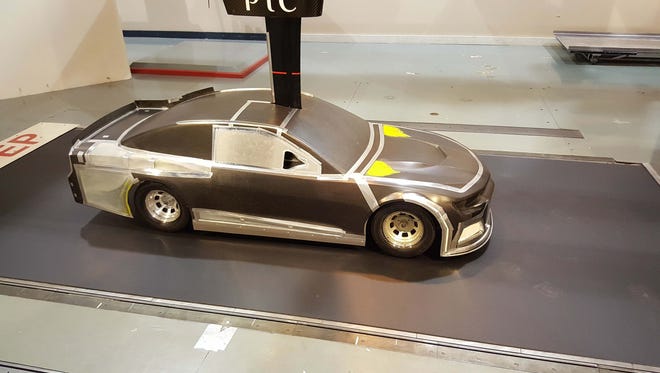 After extensive computer aero testing, a full scale model of the Camaro NASCAR Cup racer was built for further wind tunnel testing and development.