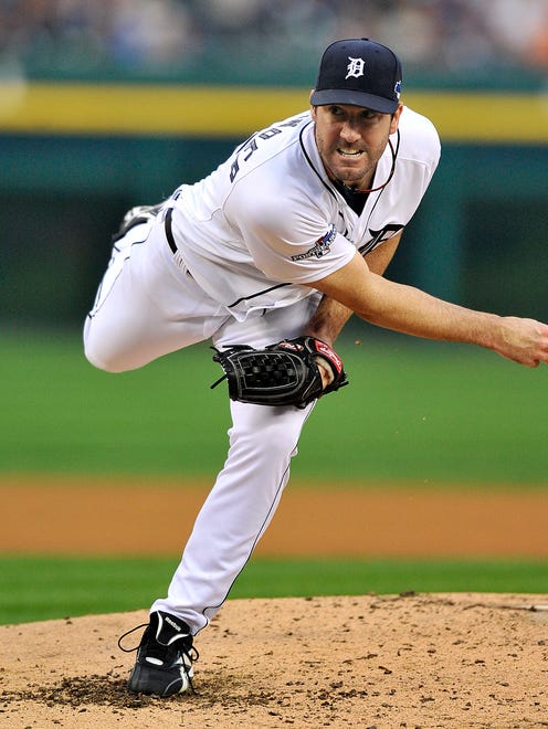 Justin Verlander snarls while he delivers a pitch against the Boston Red Sox in Game three of the 2013 ALCS series.