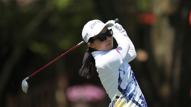 Ayako Uehara of Japan drives from the 16th tee during the first round.