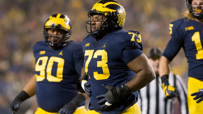 Go through the gallery to view Justin Rogers' NFL mock draft, which includes Michigan defensive lineman Maurice Hurst (73).