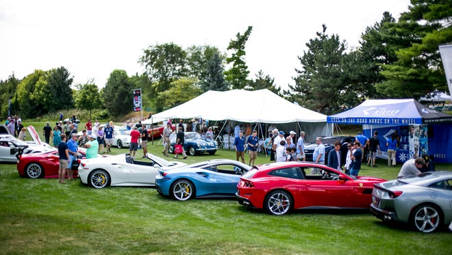 Cars are displayed at the 40th annual Concours d'Elegance of America car show.