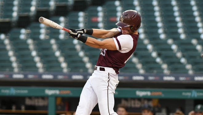 Eaton Rapids High School's Lewis Beals rips a fifth-inning triple for the West All-Star team.