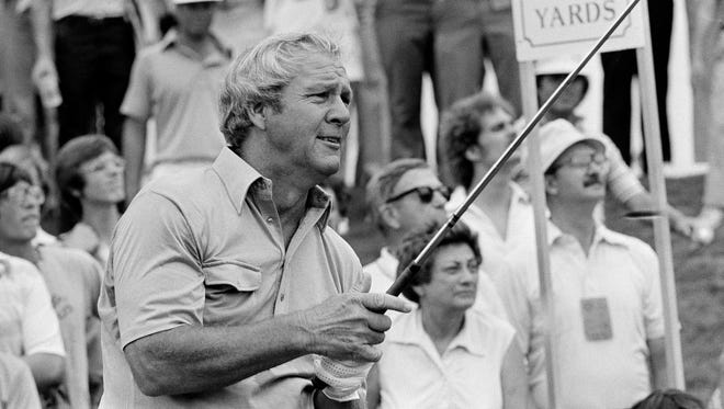 Arnold Palmer watches his shot during the 1979 PGA Championship at Oakland Hills Country Club in Bloomfield Township.