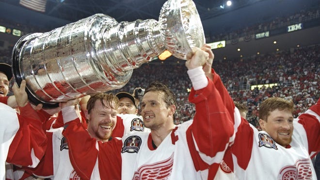 June 7, 1997: Captain Steve Yzerman and the Detroit Red Wings swept the Philadelphia Flyers to win their first Stanley Cup since 1955. (Dave Guralnick/Detroit News)