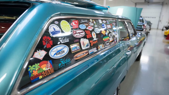 A 1968 Chevrolet Impala SS wagon that used to be owned by a surfer.
