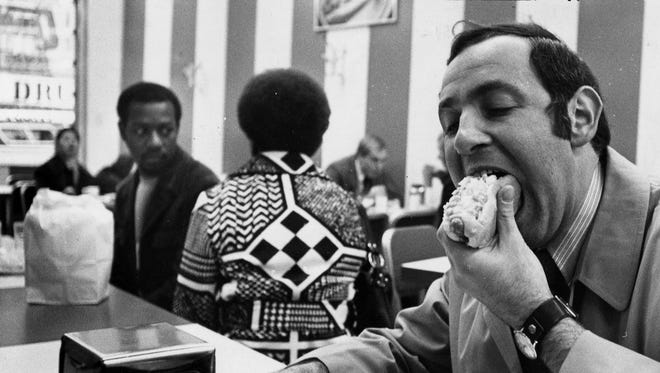Then as now, customers chow down at the American Coney Island on Lafayette in 1970.