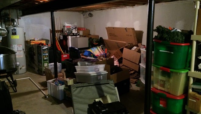 A "before" image of a basement local organizer Donna Lindley of Organize Your World in Rochester Hills was asked to tackle. Lindley said cluttered basements are a top request from clients (getting organized with paper clutter is the No. 1 request).