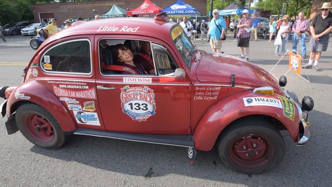 Team Little Red with driver John Layzell and navigator Celia Layzell in their 1970 Volkswagen Beetle which also participated in the Peking to Paris race.