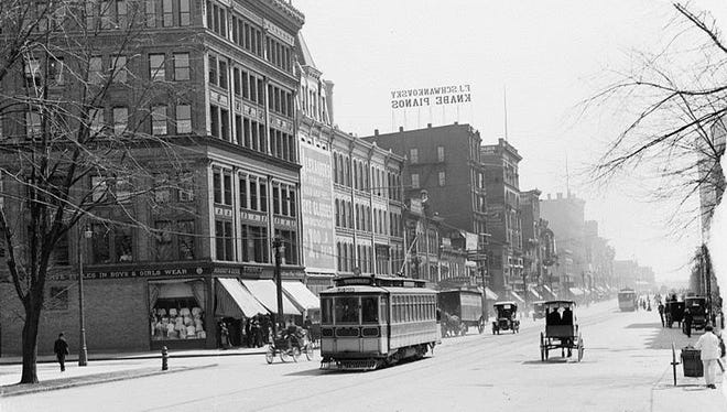 Woodward Avenue circa 1920 was in the midst of a transportation transition, with electric trolleys, horse-drawn vehicles and automobiles sharing the street.