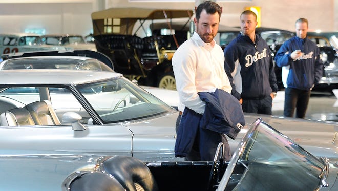 Detroit Tigers pitcher Justin Verlander, know for his love of sports cars, looks over a 1951 Le Sabre Concept two seater convertable at the GM Heritage Center in Sterling Heights, Michigan on January 22, 2016.