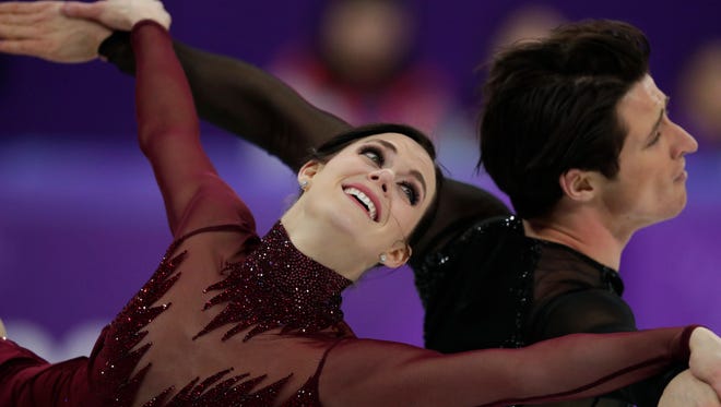 Tessa Virtue and Scott Moir of Canada perform during the ice dance, free dance figure skating final in the Gangneung Ice Arena at the 2018 Winter Olympics in Gangneung, South Korea on Tuesday.