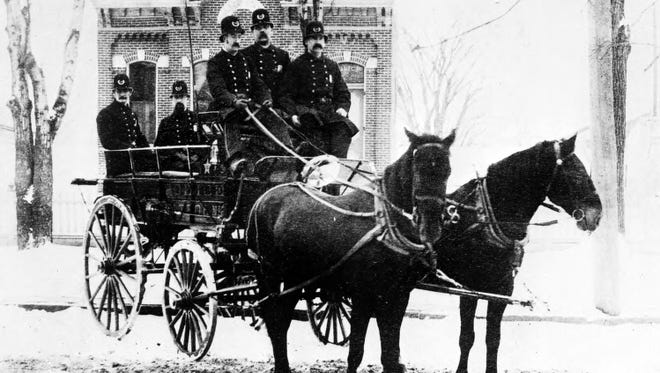 Detroit's first police patrol wagon is shown in an undated photo.