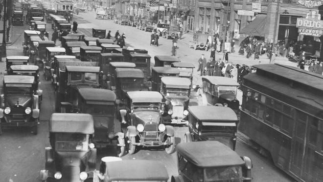 Motorists drive along Jefferson Avenue, date unknown.  In just two months in 1908, 31 people were killed by motor vehicles in Detroit.