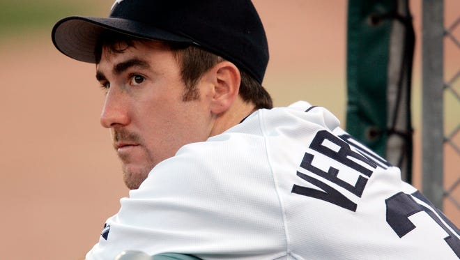 A young Justin Verlander watches a game from the dugout at Comerica Park in 2006.