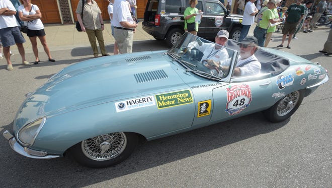 Team Retube Co. with driver Edward Obermyer and navigator Eric Fayard in their 1963 Jaguar E-Type.