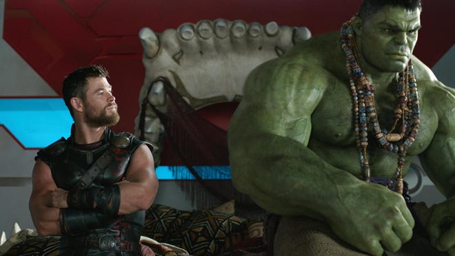Chris Hemsworth, left, and the Hulk in a scene from “Thor: Ragnarok.”