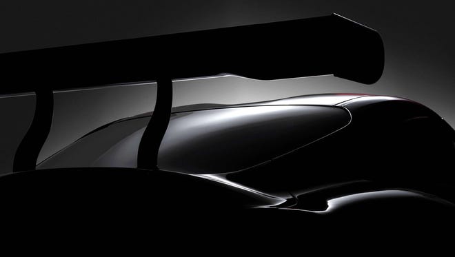 Toyota teased its coming Supra with this photo of "a modern racing concept (that) signals Toyotas commitment to bring back to the market its most iconic sports car. Get the full scoop on March 6th at 3:45 a.m. (EST)." The concept echoes the FT-1 concept shown in Detroit in 2014 with its dual-bubble roof, duck tail trunk, and high wing.