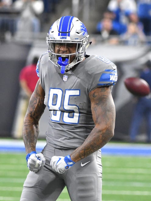 Lions tight end Eric Ebron celebrates after a first-down completion in the first quarter.