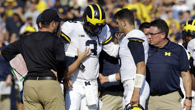 Michigan quarterback Wilton Speight leaves the field after being injured at Purdue on Sept. 23.