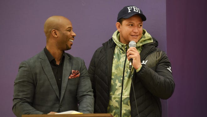 Fox Sports Detroit broadcast analyst Craig Monroe, and former Tiger outfielder, laughs while Miguel Cabrera, right, answers a question during the Tigers winter caravan last year.
