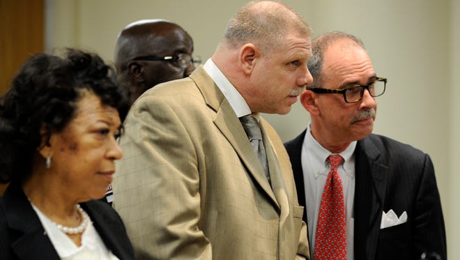 Joseph Gentz, flanked by defense attorneys Susan Reed and  William Winters III,  stands before Chief Judge Kenneth King in 36th District Court in Detroit on Oct. 4, 2012.  Gentz waived his preliminary examination on murder and conspiracy charges in the killing of Jane Bashara.
