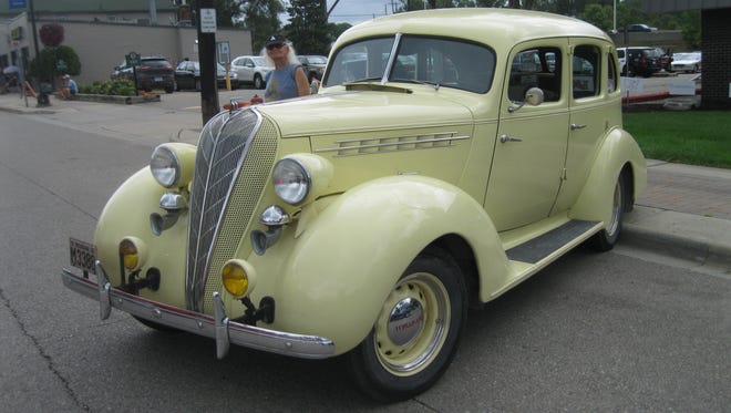 A 1936 Hudson Terraplane sedan was parked along Auburn Road with other show cars but had no owner identification.