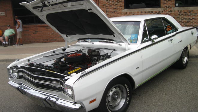 This 1969 Dodge Dart GT with Mopar Performance V-8 and four-barrel carburetor had a "for sale" sign on it.
