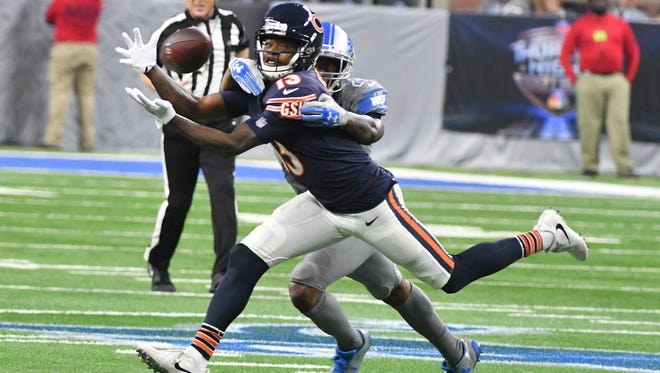 Bears' Kendall Wright can't pull in a reception with Lions'  Nevin Lawson defending in the third quarter.