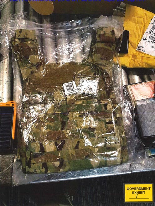 Federal agents seized several items from Yousef Ramadan's luggage, including armor plates, a bullet-proof vest, pepper spray, a gas mask, an aerial drone, a Taser and tactical knives.