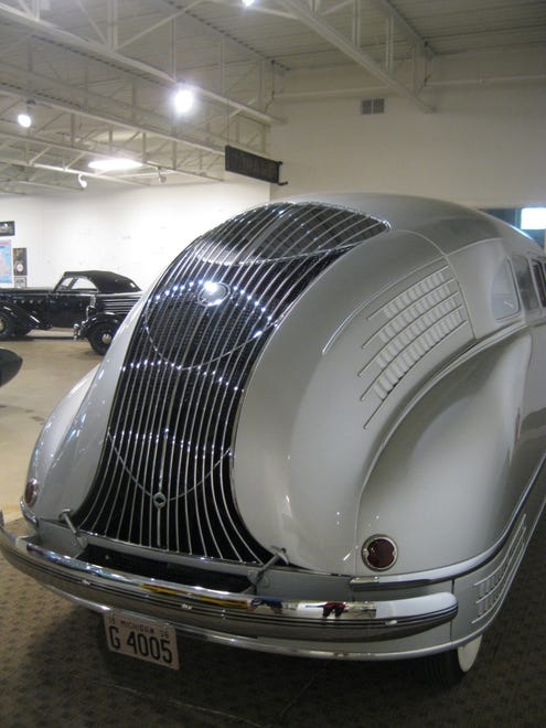 The Scout Scarab followed the trend toward aerodynamic bodies tested by larger auto makers. The car feature an aluminum roof, hood and rear wings on either side of its rear-mounted, Ford-built flathead V-8. Doors and dashboard are of magnesium.  The driver's seat and rear seat are bolted in place.