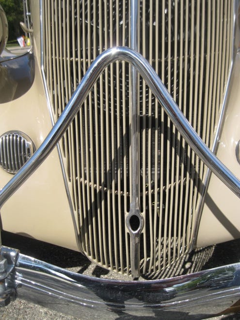 Ford offered a crank start on some cars, including this 1936 Ford owned by Roger Oliver of Ames, Iowa, with an opening for a crank at the base of its tall grille.