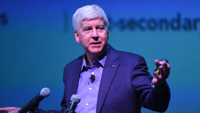 Governor Rick Snyder speaks at the Michigan Science Center in this February 22, 2018 file photo. A federal judge has dismissed a civil lawsuit filed on behalf of Detroit students fighting to establish literacy is a U.S. constitutional right. Attorneys for Gov. Rick Snyder and state education officials argued no fundamental right to literacy exists and asked the judge to reject what they called an “attempt to destroy the American tradition of democratic control of schools.”