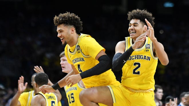 Forward Isaiah Livers, left, and guard Jordan Poole will likely open the 2018-19 season in Michigan's starting lineup.