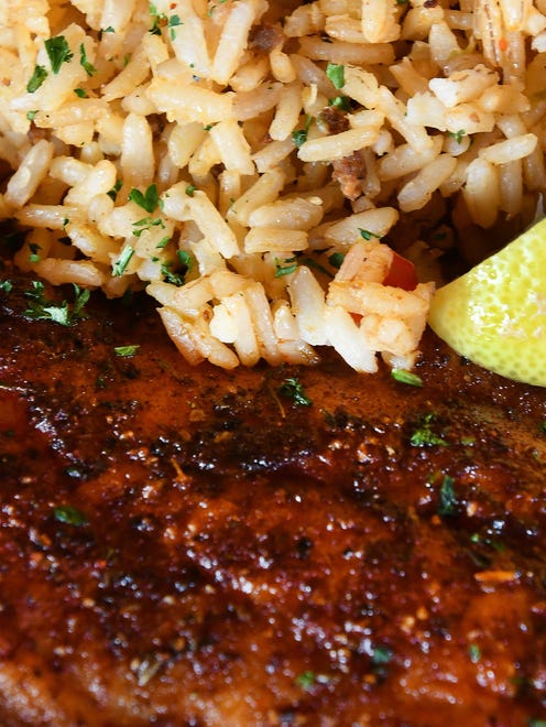 You can practically taste this photograph of Howe's Bayou blackened catfish with dirty rice.