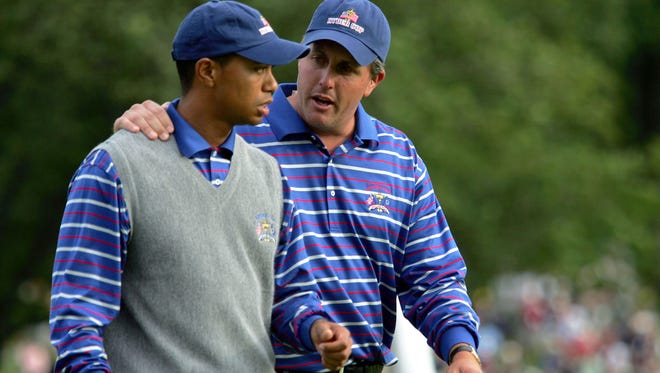 Tiger Woods and Phil Mickelson were briefly partners during the 2004 Ryder Cup at Oakland Hills.