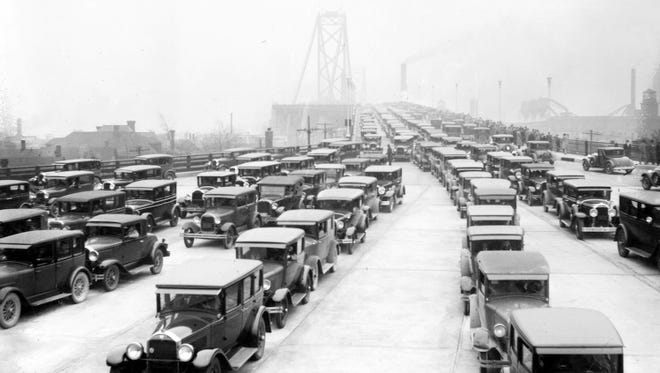 Some things never change: Long lines of cars exit the Ambassador Bridge, circa 1930.