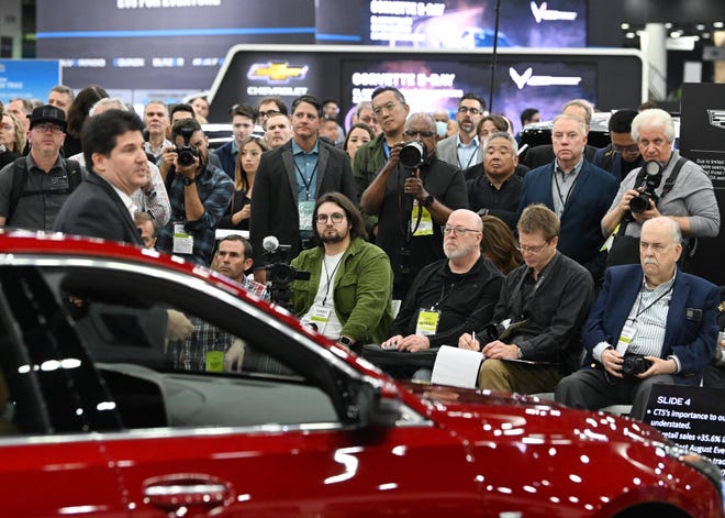 The audience looks on during the Cadillac reveal of a refreshed version of its gas-powered CT5 sedan at the North America International Auto Show at Huntington Place in Detroit, Michigan on September 13, 2023.