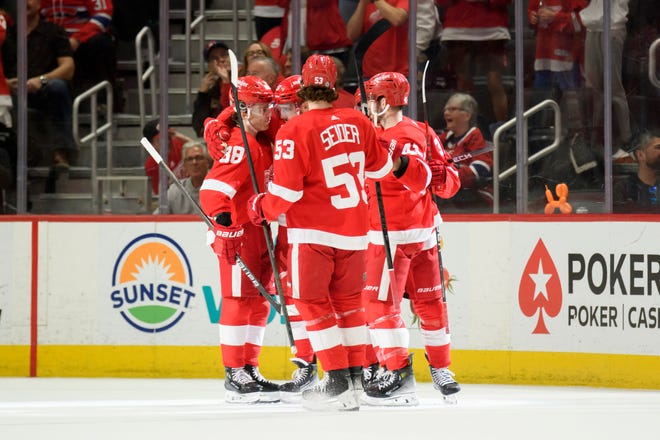 Detroit celebrates a goal by left wing J.T. Compher during the second period.