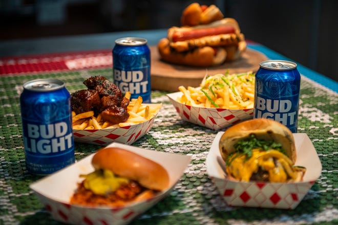 A smashed burger, crispy hot Nashville chicken sandwich, smoked brisket burnt ends over french fries, and grilled hotdogs will be featured on a special menu for the NFL draft at Table No. 2, an upscale restaurant located in Detroit's Greektown.